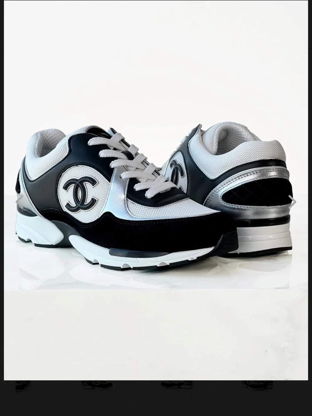 CHANEL Black White Silver CC Logo Runner Sneakers